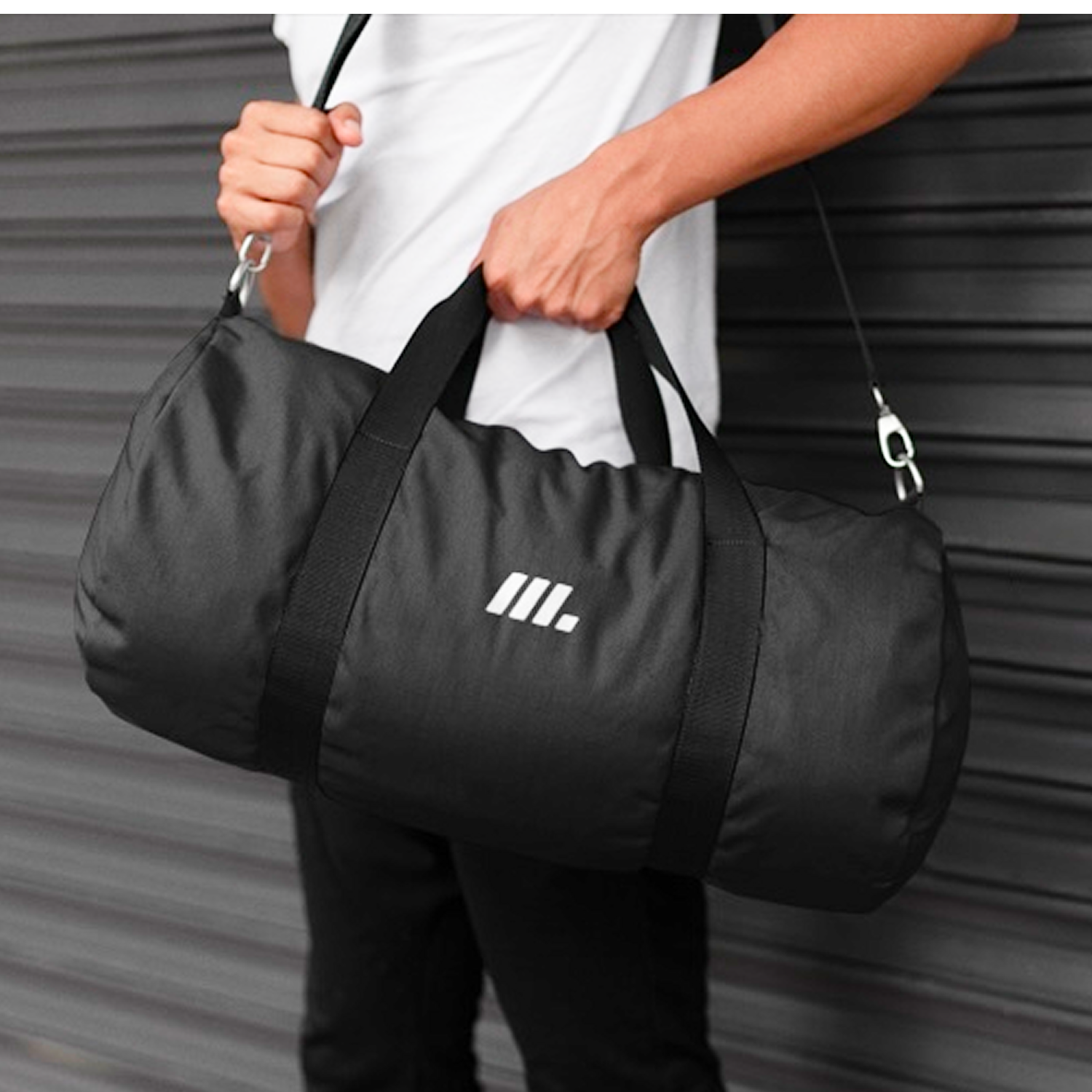 Bolsa negra con logo de Magrolabs